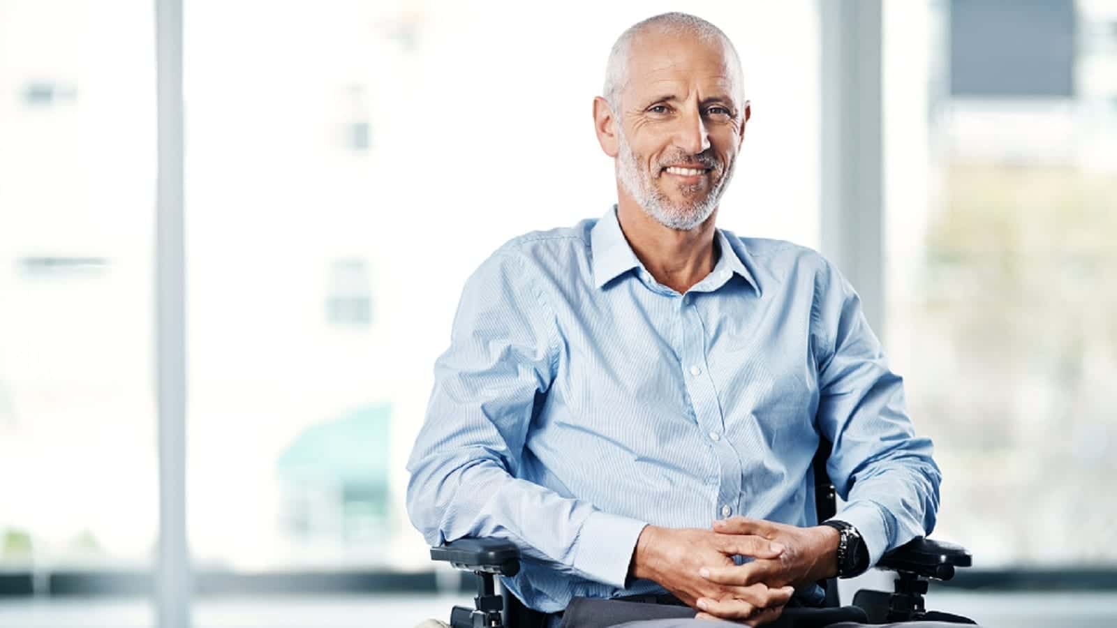 Elderly Man Sitting In Wheelchair Stock Photo
