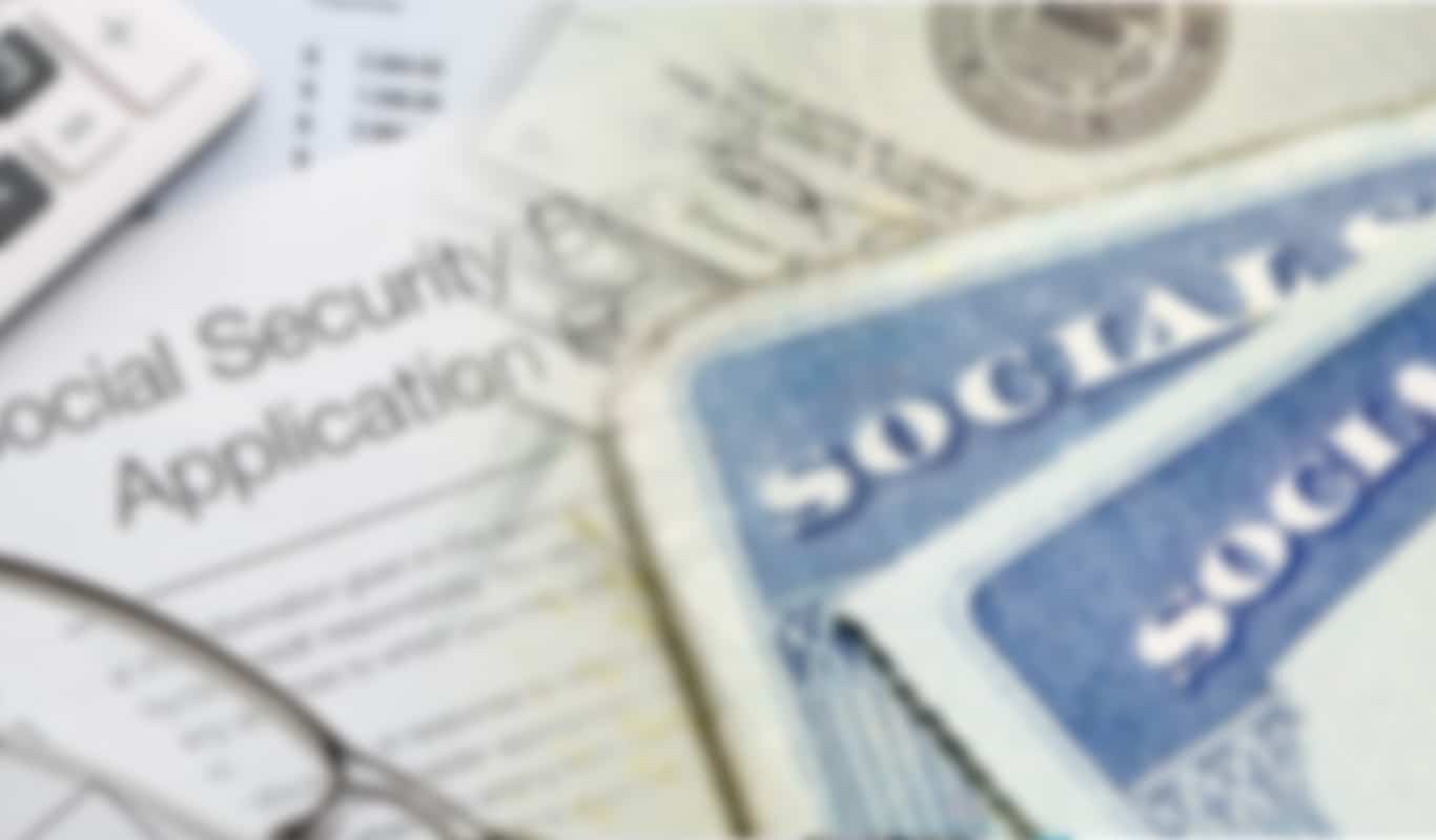 Social security cards in front of social security application