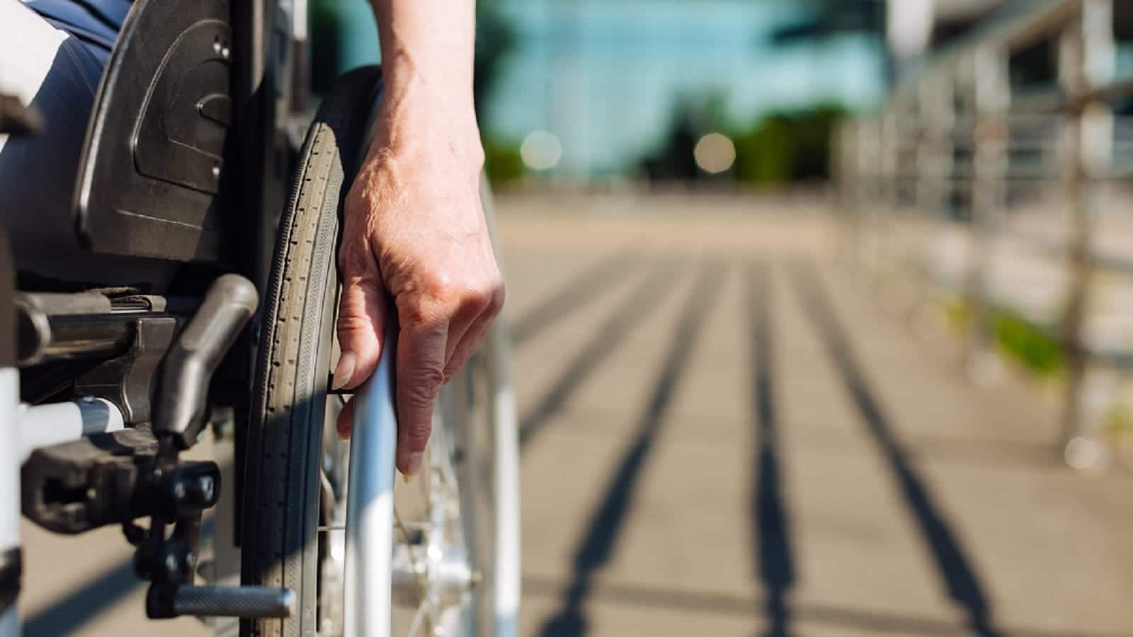 Woman In A Wheelchair Stock Photo