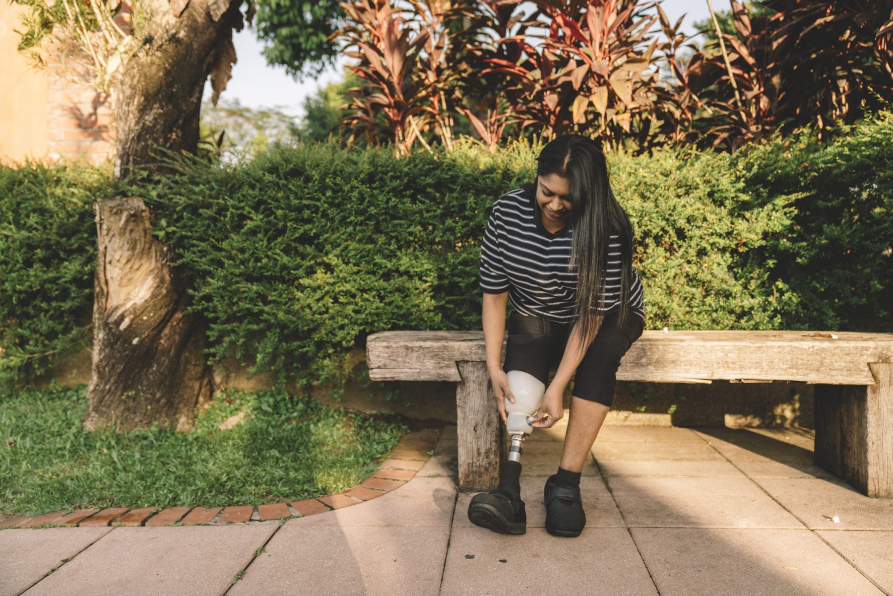 A woman with a prosthetic leg taking a walk in Los Angeles